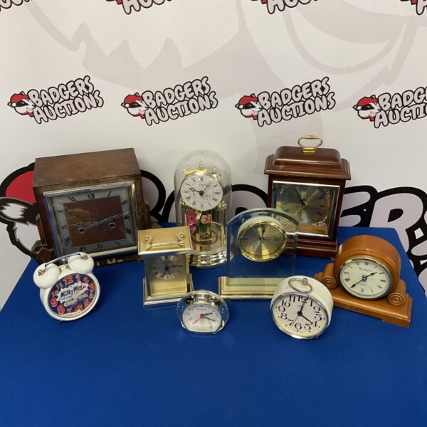 Vintage clock collection featuring mantel clocks from Wm Widdop and London Clock Company.