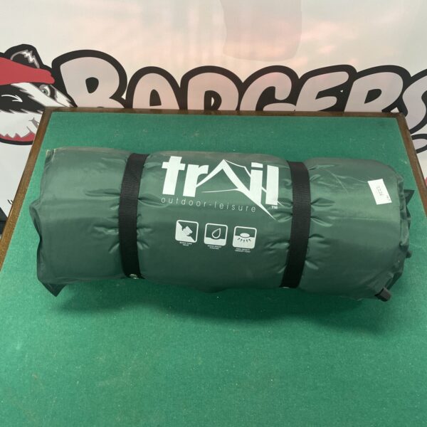 Rolled Trail Outdoor Leisure inflatable sleeping mat for camping.