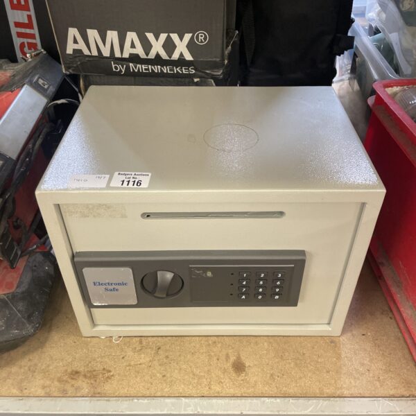 Amxx electronic safe with digital keypad for secure storage.