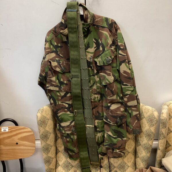 Front view of a British Army DPM camo combat jacket with belts.