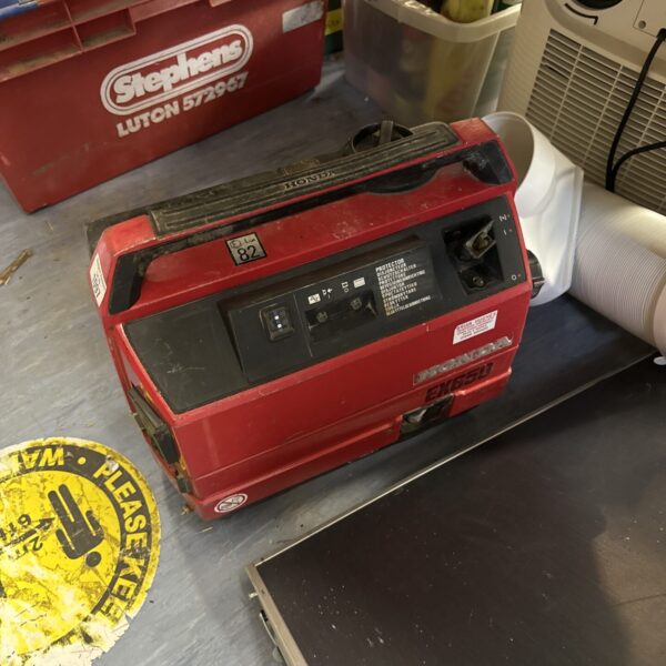 Side view of a used Honda EX650 petrol generator.