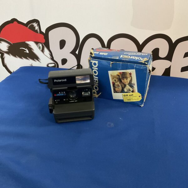 Vintage Polaroid 600 instant camera in good condition.