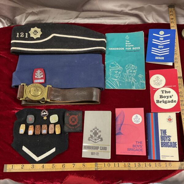 Vintage Boys Brigade collection featuring cap, belt and booklets.