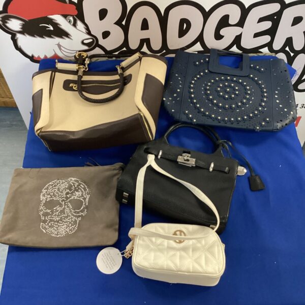 Ladies handbags lot featuring quilted, cream, and patterned purses.