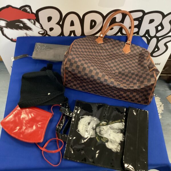 Ladies handbag lot featuring Harrods and Dorothy Perkins bags.