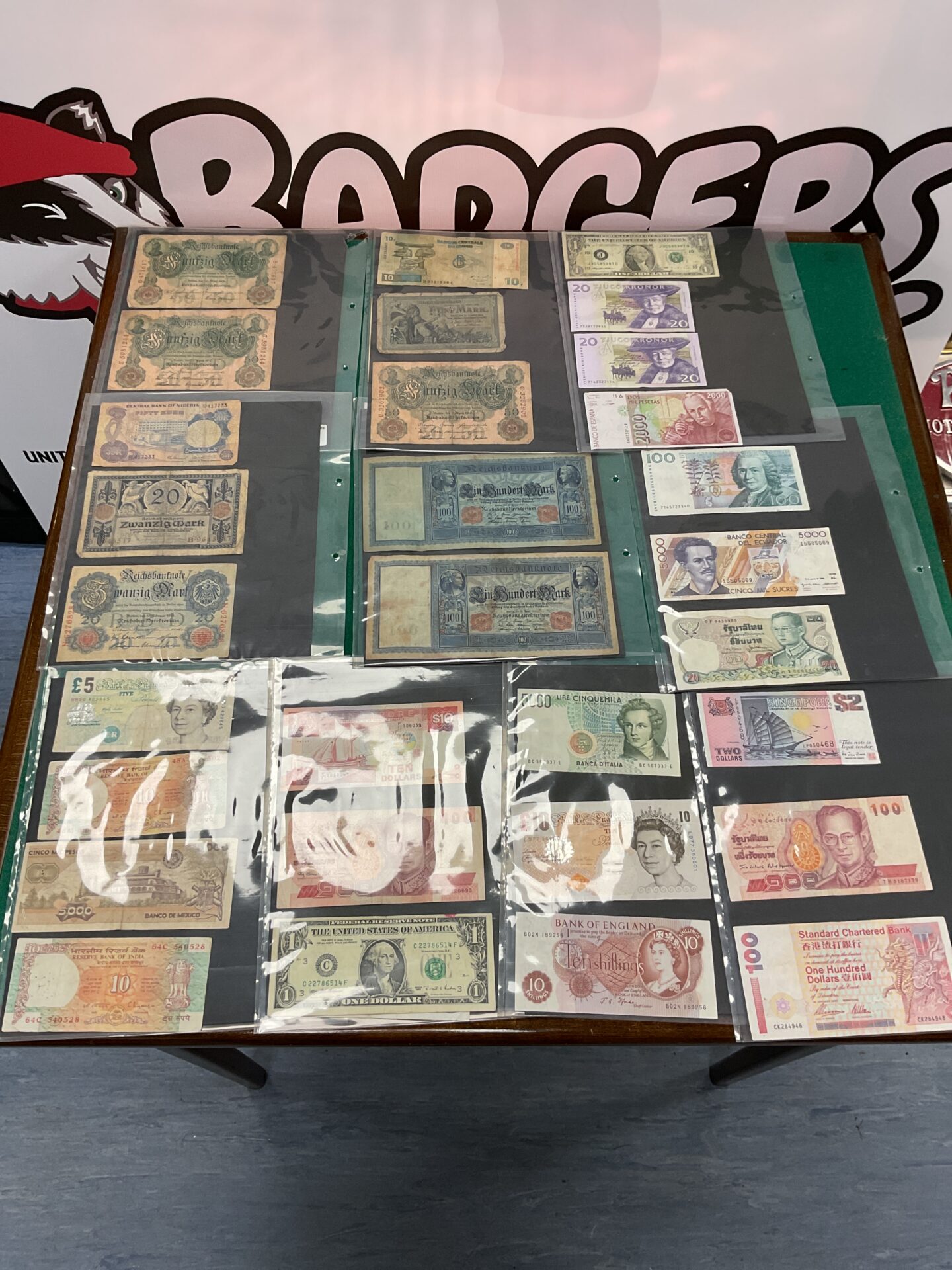 878 Ten folder pages of Assorted banknotes
