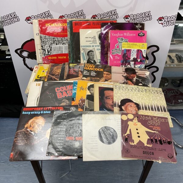 Vintage vinyl record collection featuring Decca records and artists like Peter Sellers.
