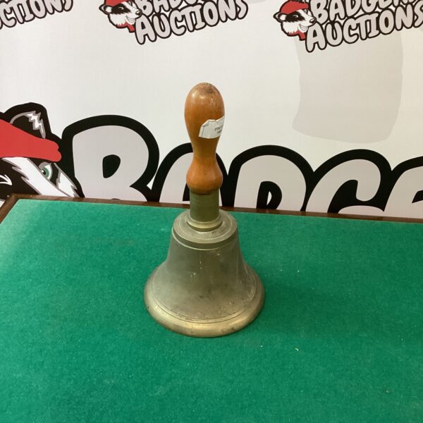 Vintage ARP hand bell with wooden handle, WWII era signalling device.