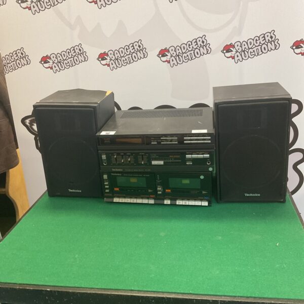 Vintage Technics hi-fi system component in black.