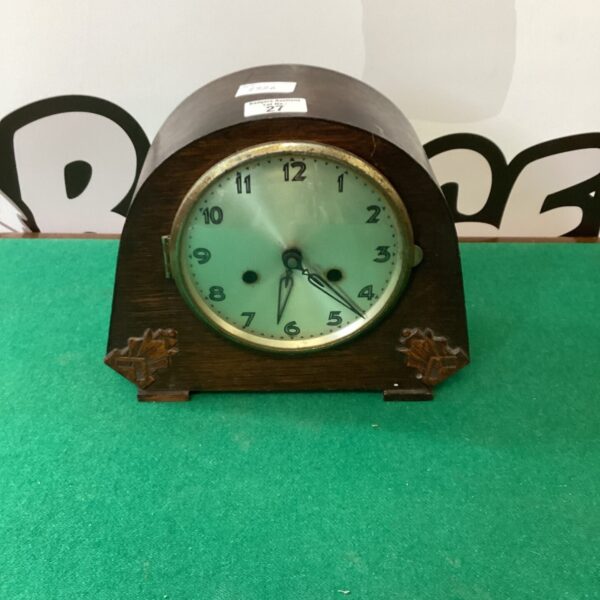 Vintage mahogany chiming clock with Westminster chime.