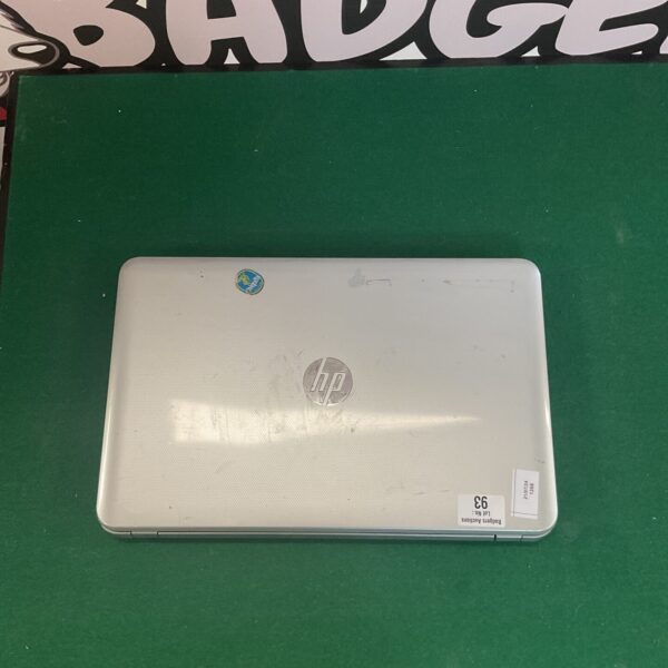 Silver HP Pavilion laptop, used condition, portable computer.