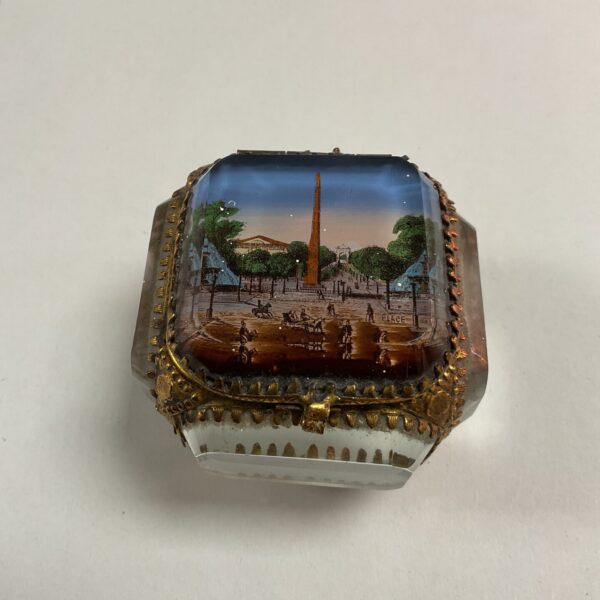 Antique pictorial ring box with glass and velvet lining.
