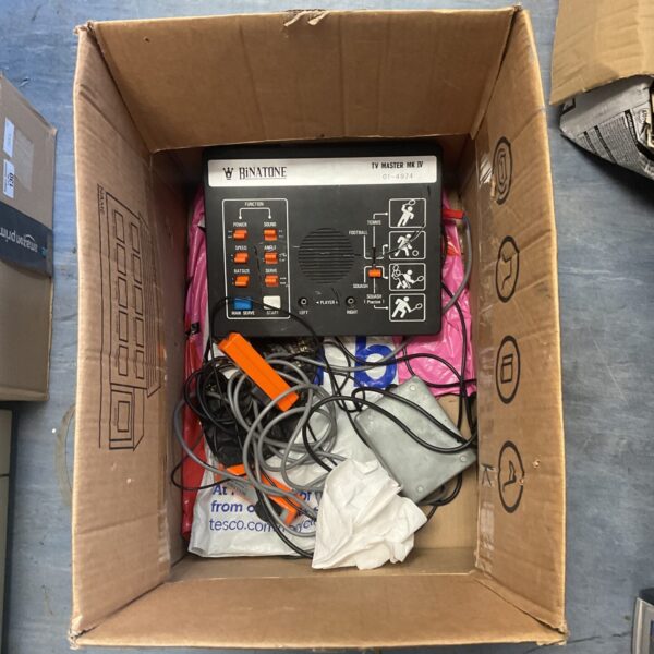 Vintage Binatone TV Master MK IV handheld gaming console with cables.