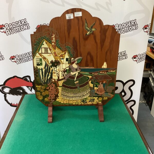 Vintage mahogany fire guard with painted garden scene.
