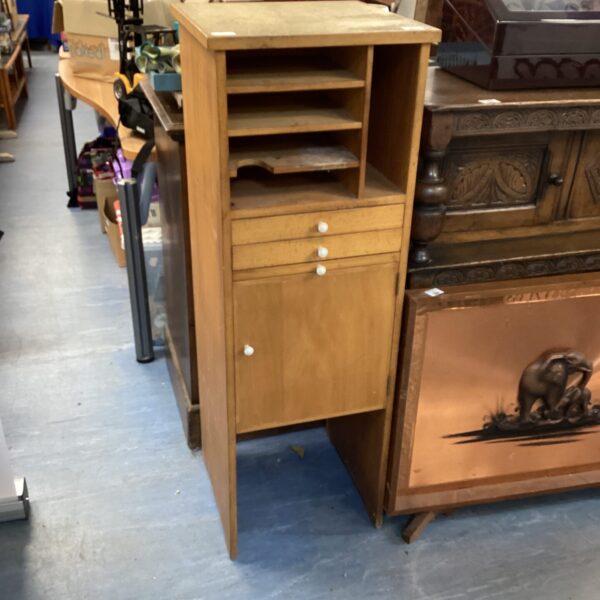 Vintage teak stationary cabinet with open shelving.