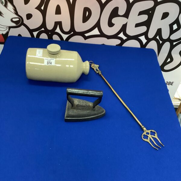 Vintage ceramic hot water bottle, iron and brass toasting fork set.