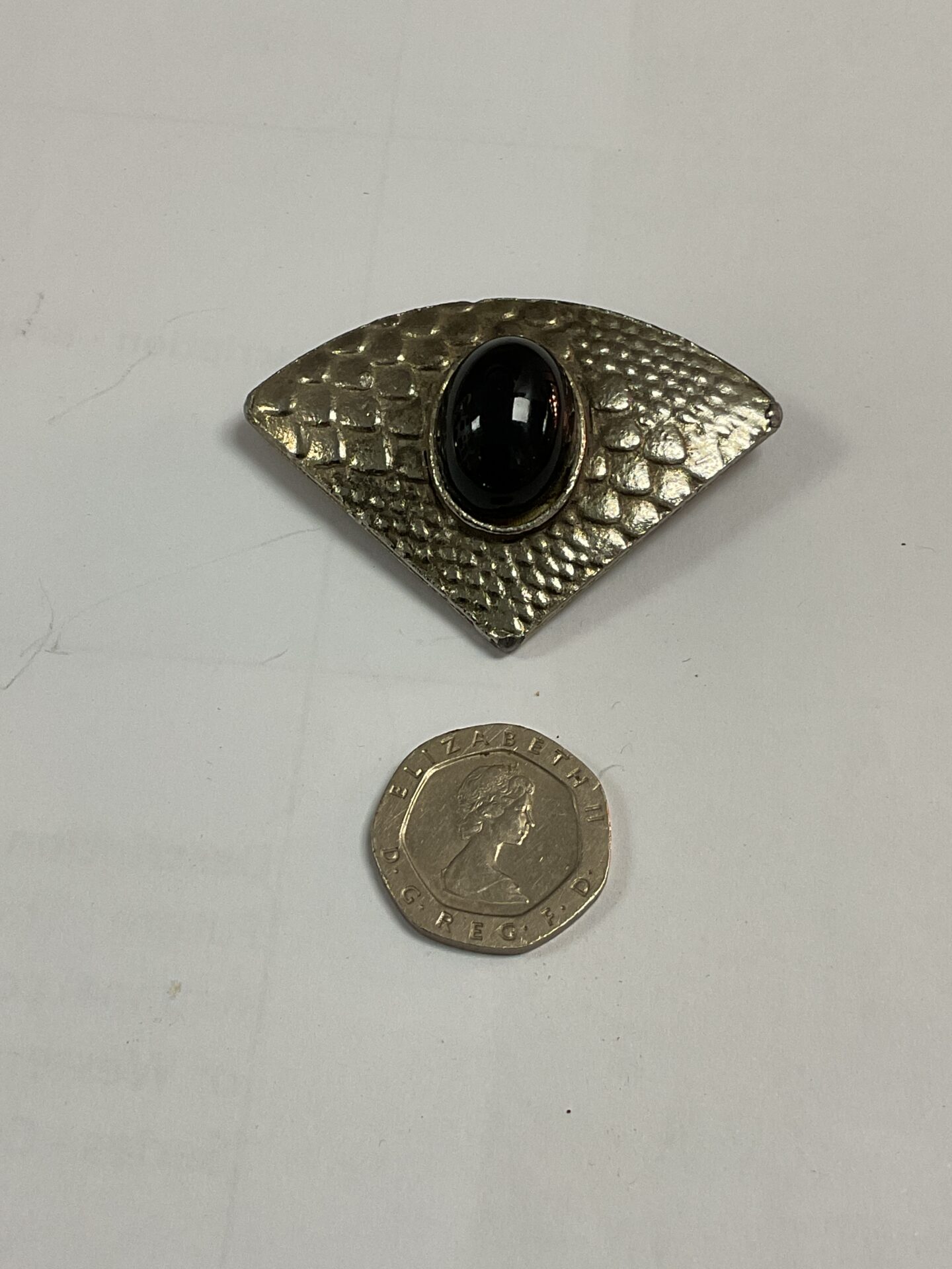 782 Vintage Swarovski Silver Tone Scale Pattern Brooch with black stone.