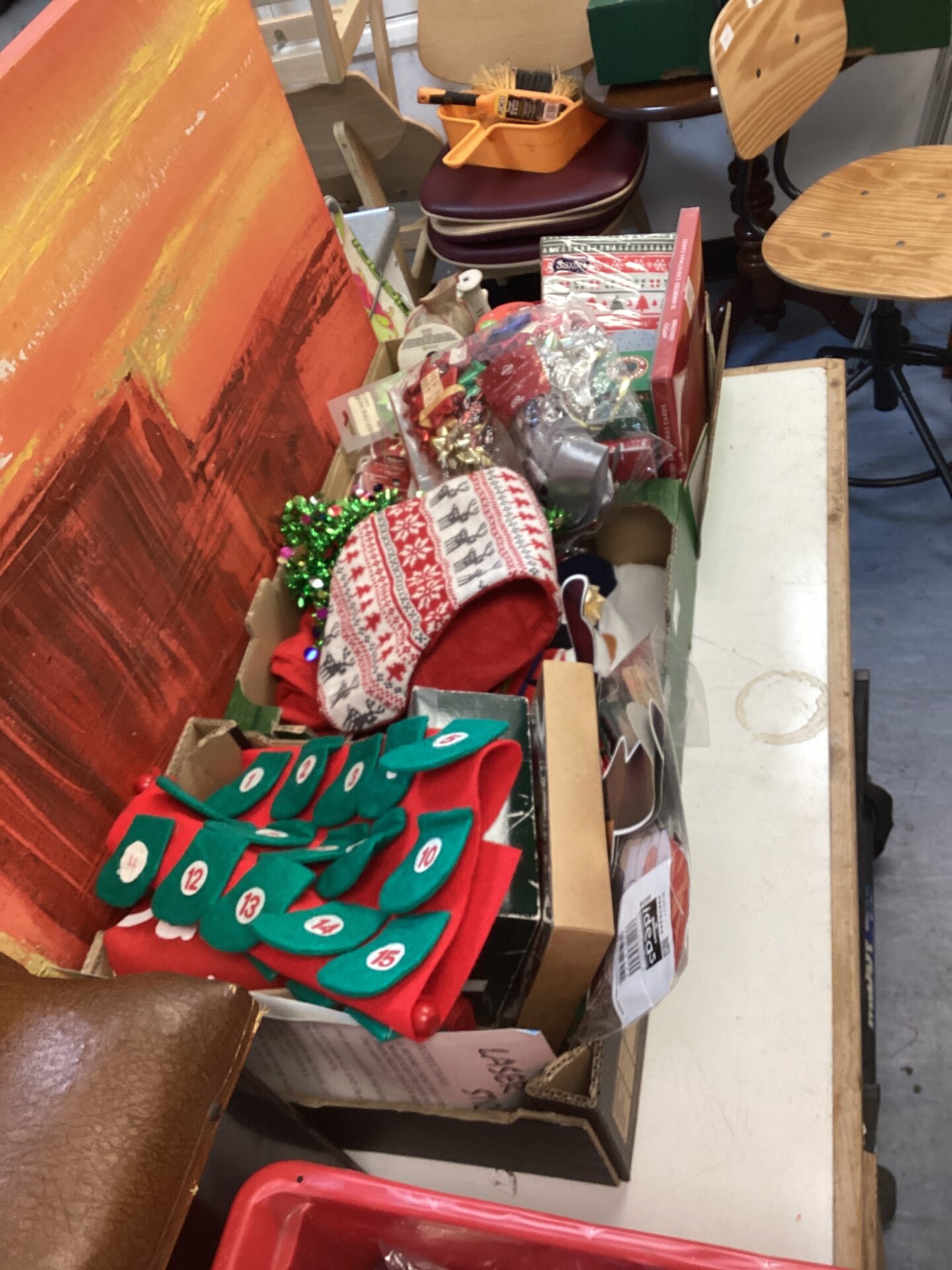 496 Three trays of mixed christmas related items inc stockings, advent calendar’s & gift bows