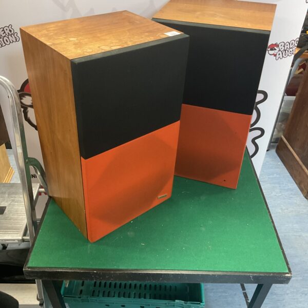 Vintage Pioneer CS-R300 bookshelf speakers in a home setting.