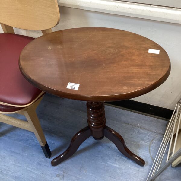 Vintage mahogany oval hall table with turned legs.