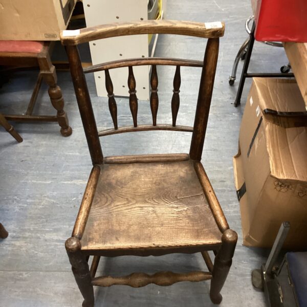 Front view of a vintage Victorian hall chair.