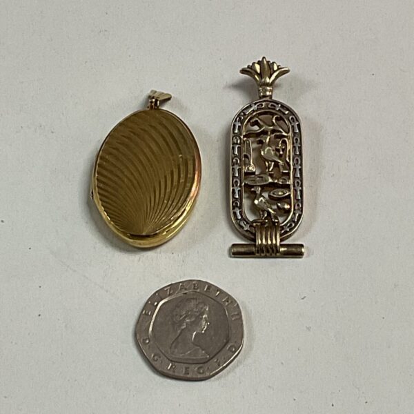 Vintage Egyptian Revival pendant and locket in silver gilt and rolled gold.