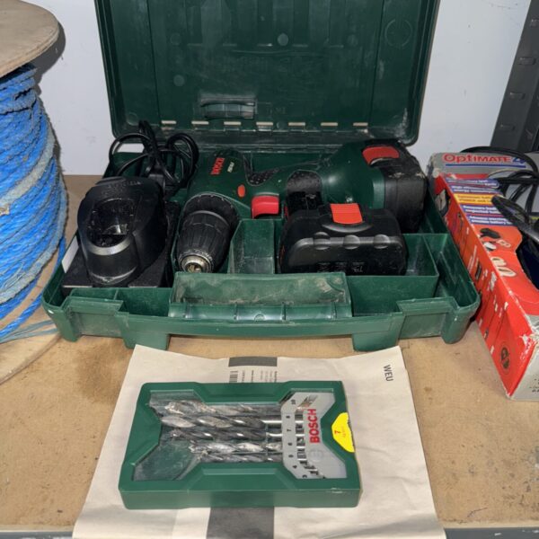 Bosch PSR 14.4 cordless drill set in carrying case.