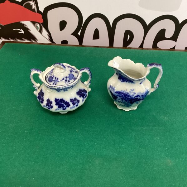 Vintage Johnson Bros porcelain jug and sugar bowl set with floral design.