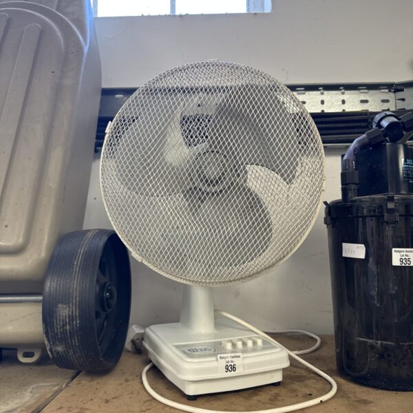 Vintage Ethos desk fan on a table.