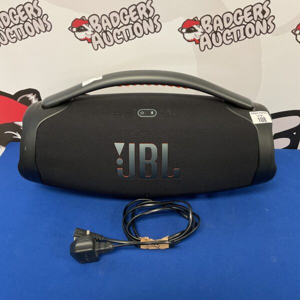 Black JBL Boombox Bluetooth speaker system, portable wireless audio.