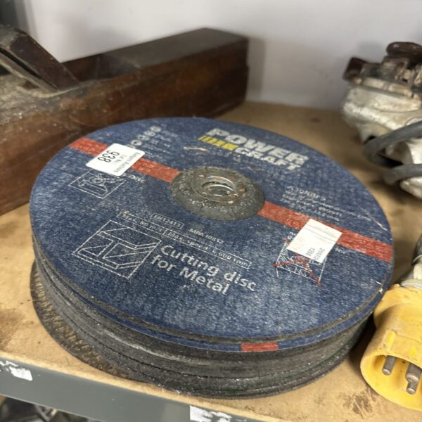 Close-up of used angle grinder metal cutting discs for metalworking.