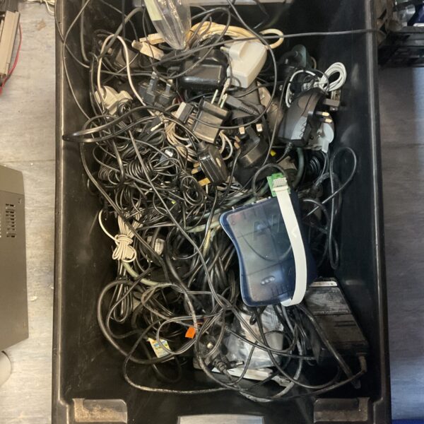 Mixed cable lot with various power and data cables.