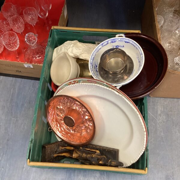 Mixed kitchenware lot with vintage plates and serving dishes.
