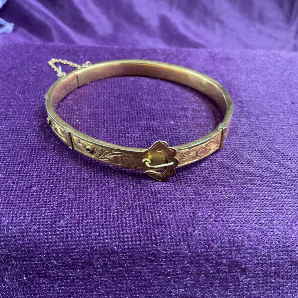 Vintage 9ct gold hinged bracelet with engraved details.