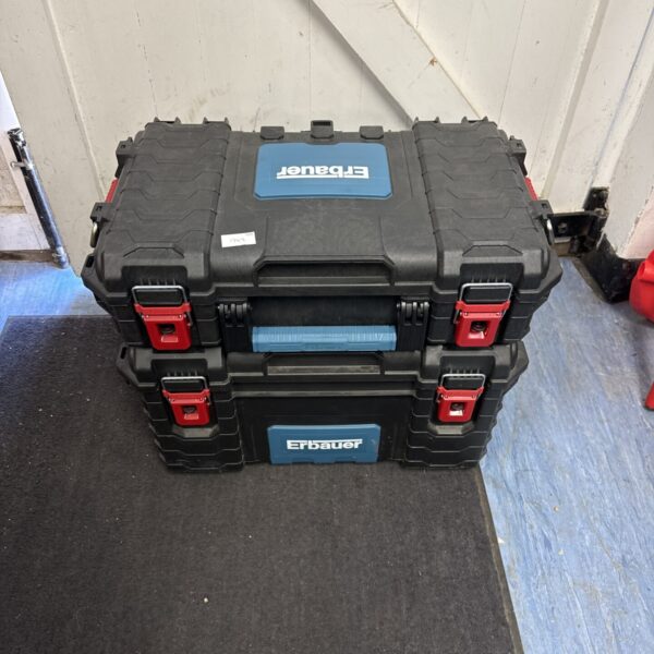 Two Erbauer stackable tool boxes for organised workshop storage.