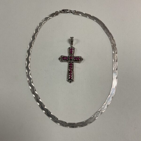 Vintage silver crucifix necklace with ruby detail.