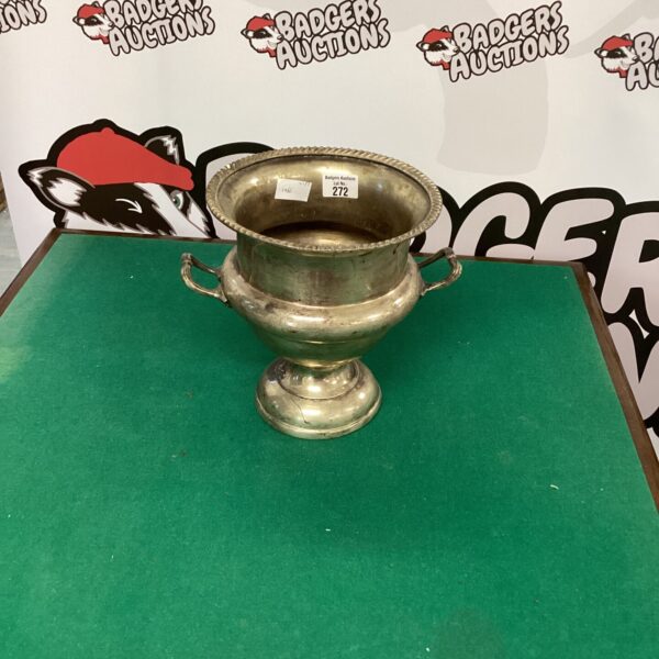 Vintage silverplate ice bucket for chilling drinks.