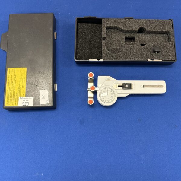 Charmilles belt tension gauge with original case and foam insert.