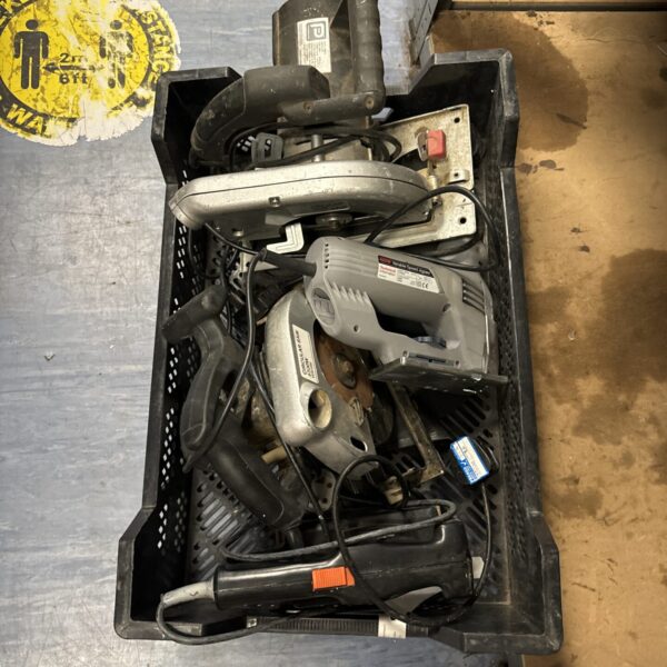 Assorted power tool lot with reciprocating saw and drill.