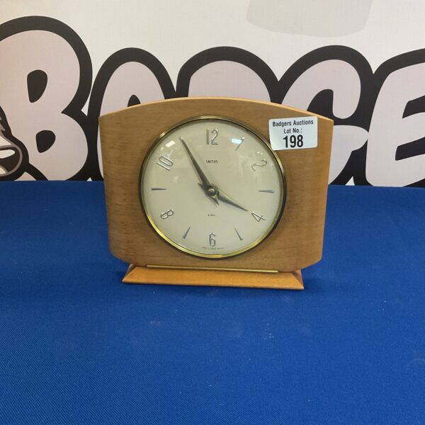 Vintage Smiths 8 day mechanical clock with white dial.