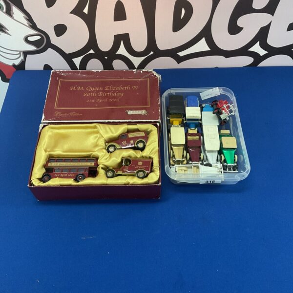 Corgi Queen Elizabeth II 80th Birthday diecast cars in original packaging.