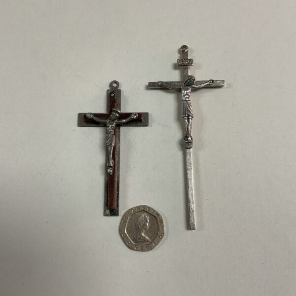 Antique crucifixes lot, featuring two vintage religious crosses.