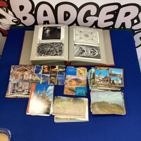 Vintage postcard collection featuring religious and wildlife scenes.