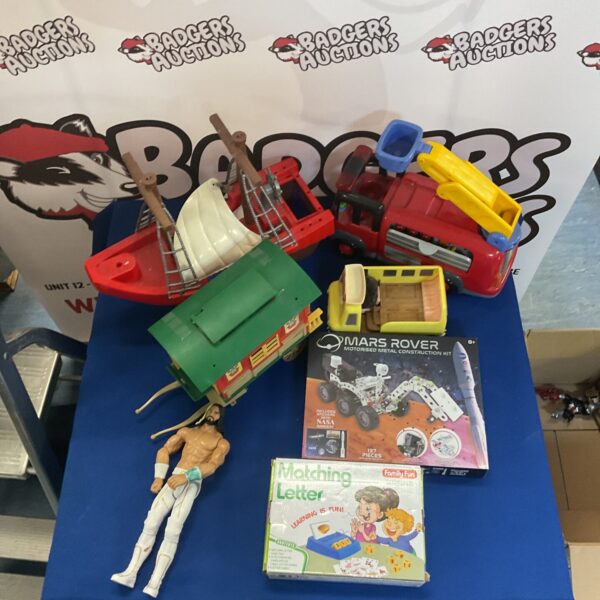 Mixed toy lot featuring Mars Rover construction kit and toy ship.