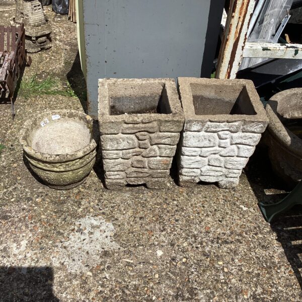 Lot of three stone effect garden planters for outdoor use.