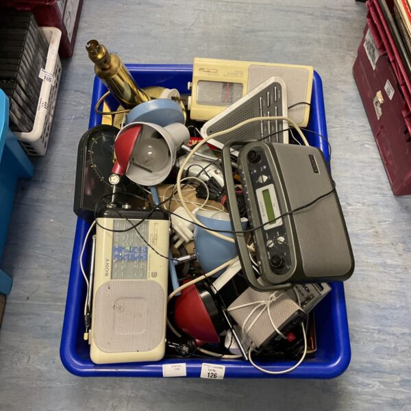 Vintage radio lot with Roberts radios and a Junghans clock on display.