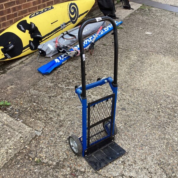 Metal folding trolley for portable transport of goods.