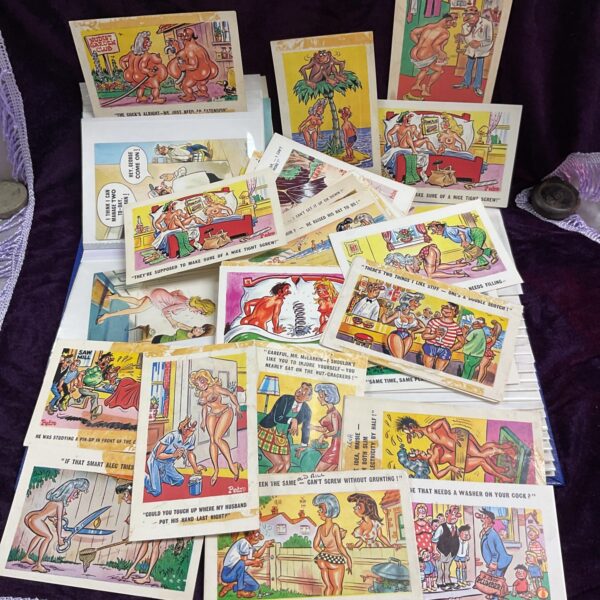 Vintage collection of saucy British seaside postcards in an album.