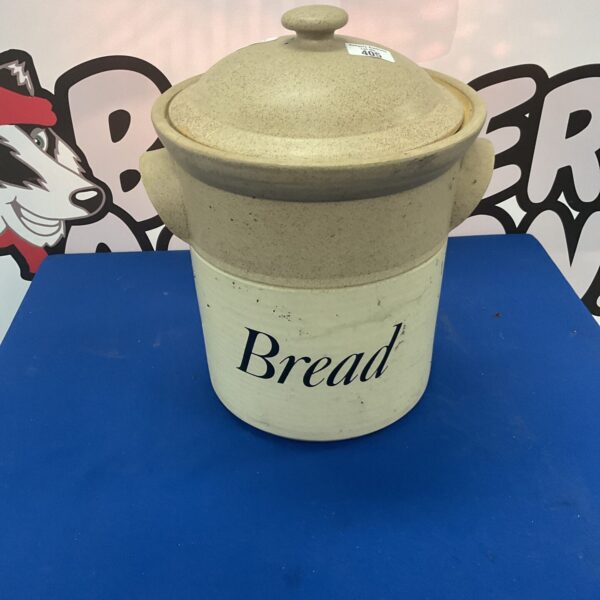 Vintage salt glazed bread bin for kitchen storage.