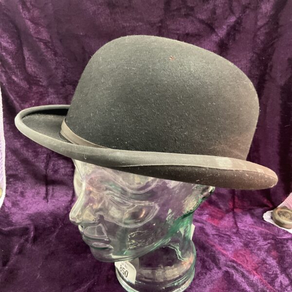 Dark felt vintage bowler hat from Christie’s of London.